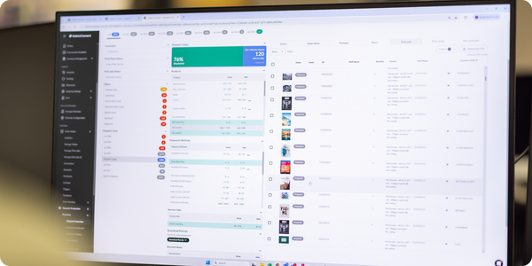 Print industry research report being reviewed in a print shop